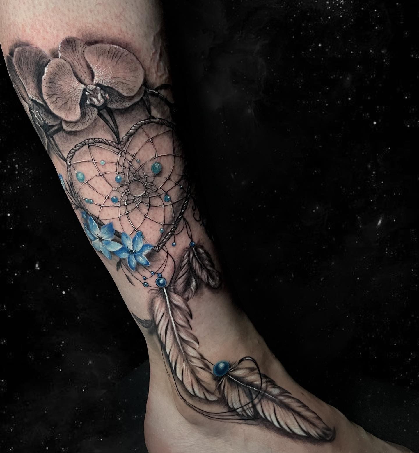 Dreamcatcher black & gray tattoo — ankle